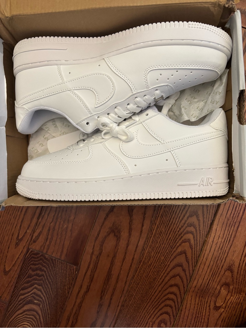 All-White Nike Airforce 1 Low Top Sneakers